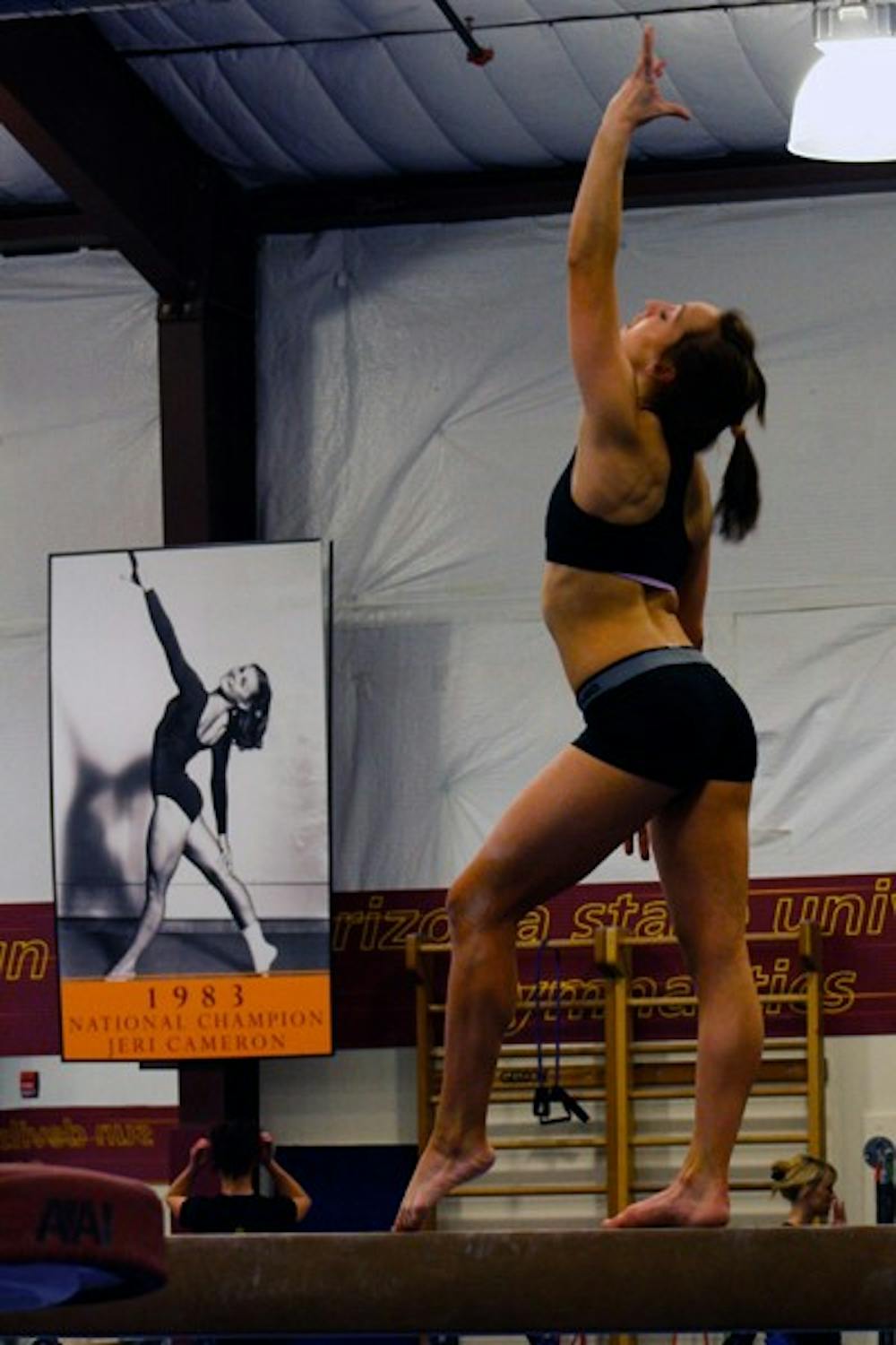 Practice form: ASU freshman Samantha Seaman works on her beam routine during practice on Feb. 1. The Gym Devils are looking for their second consecutive Pac-10 dual victory. (Photo by Lisa Bartoli)