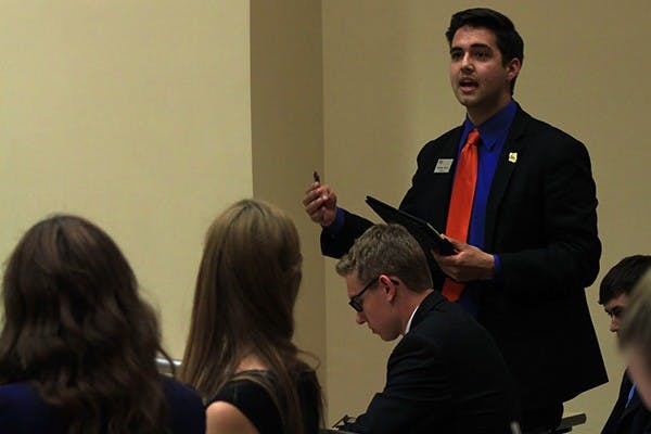 Presidential candidate Nicolas Parra responds to one of his opposing candidates with a question of his own during the USG debates on Wednesday night. (Photo by Micaela Rodriguez)