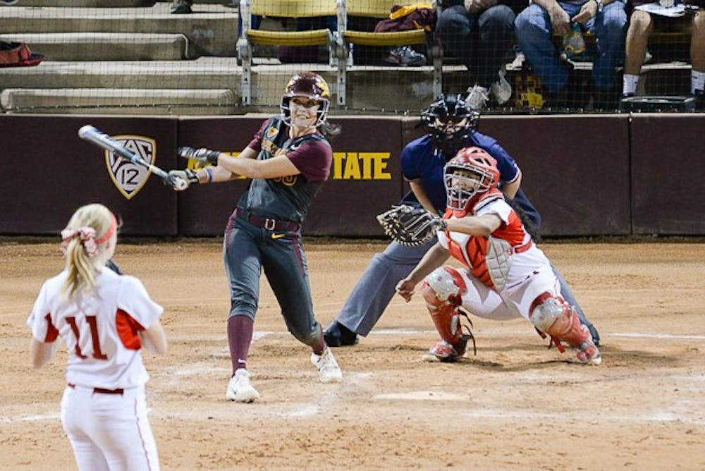 Senior outfielder Elizabeth Caporuscio hits a three-run home run in the fourth inning of a game against Boston University, Saturday, Feb. 14, 2015, at Farrington Stadium in Tempe. Caporuscio's home run contributed to a 9-4 win over BU. (J. Bauer-Leffler/The State Press)