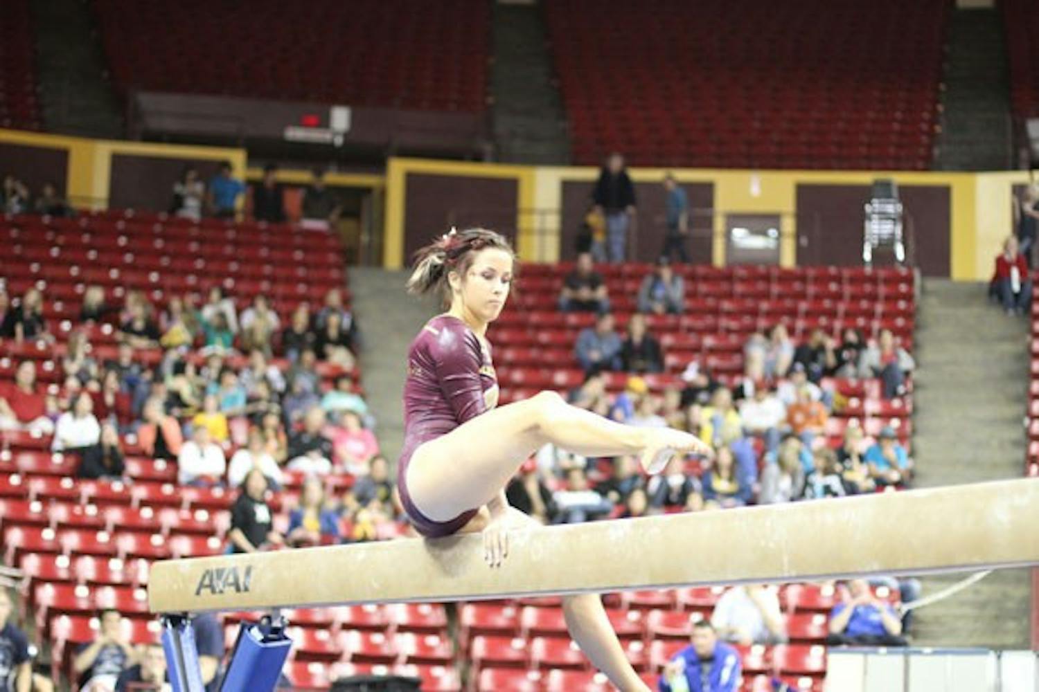 GETTING BACK UP: Sophomore Stephanie Hangartner performs a balance beam routine during ASU’s 194.650-196.925 loss to Oregon State. ASU will participate in a tri-meet with BYU and Boise State on Friday in Provo, Utah. (Photo by Nikolai de Vera)