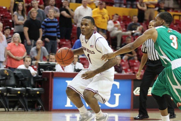 Redshirt freshman guard Jahii Carson handles the ball at the top of the key during the Sun Devils’ 97-70 win over Florida A&M on Sunday. (Photo by Kyle Newman)