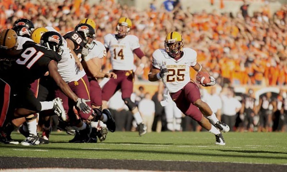 STEADY SCORER: Freshman running back Deantre Lewis rushes into the end zone against Oregon State on Sunday. Lewis finished with 104 yards and a touchdown, making it his third straight game over 100 yards. (Photo Courtesy of the Daily Barometer)