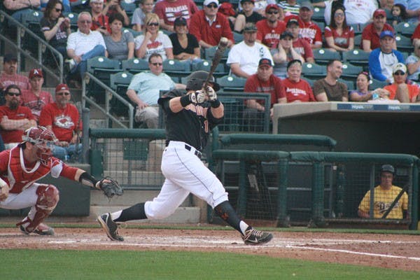 Junior infielder Michael Benjamin takes a hack at a pitch against Arkansas on March 2. The No. 24 ASU baseball team took care of Pacific on March 1 offensively by putting up eight runs on the Tigers. (Photo by Hector Almeida)