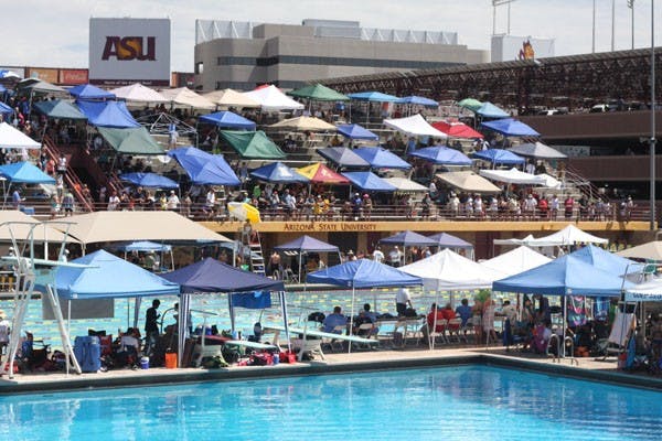 SERWAA ADU-TUTU | THE STATE PRESSSWIM FANS: Hunderds of spectators gather at the Mona Plummer Aquatic Center Saturday morning for a swim meet.