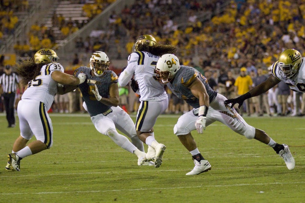 ASU junior defensive lineman Christian Hill (94) makes a tackle during a kickoff in the second half of the 23-20 victory over the UCLA Bruins in Sun Devil Stadium in Tempe, Arizona, on Saturday, Oct. 8, 2016.