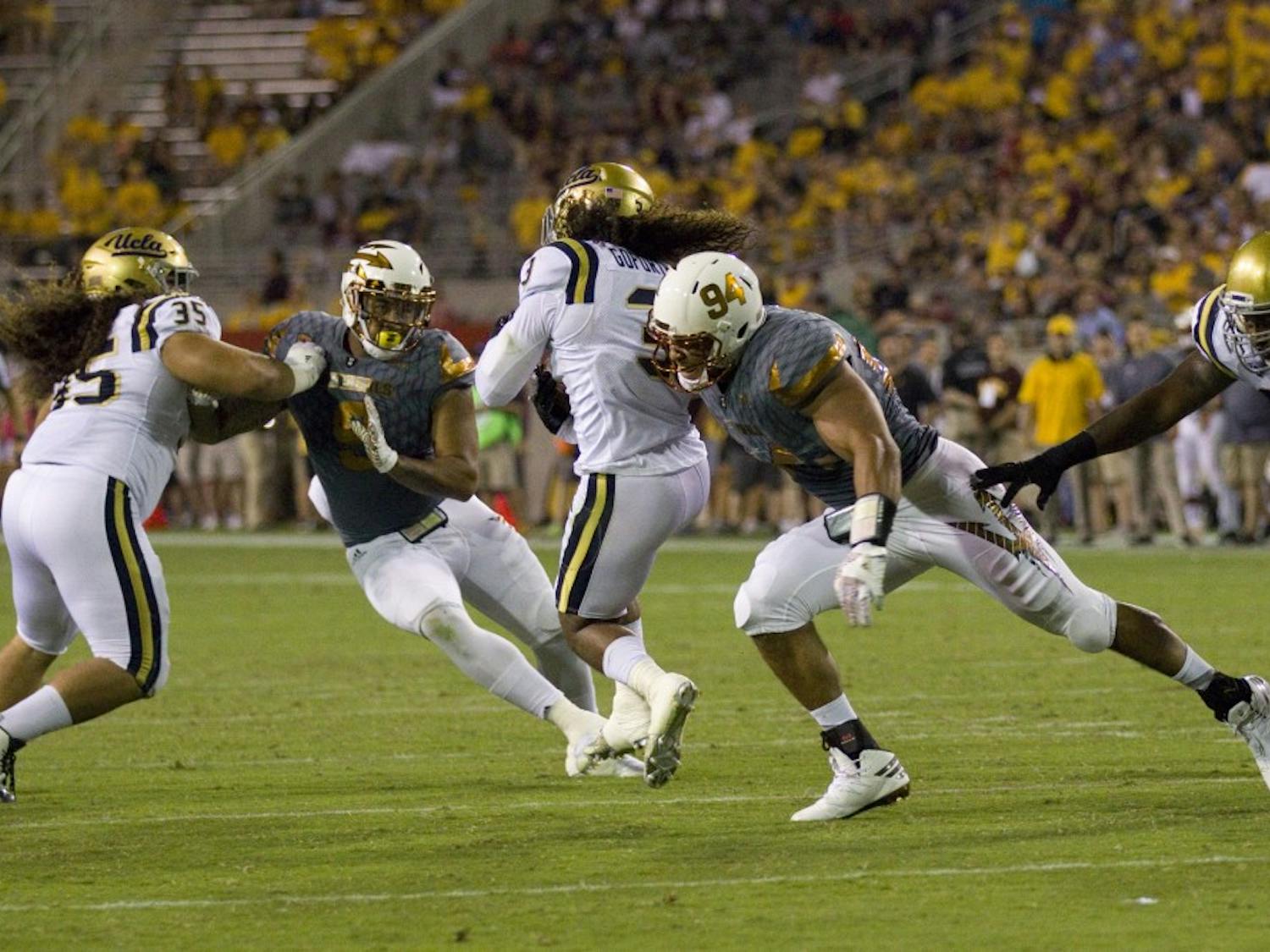 ASU junior defensive lineman Christian Hill (94) makes a tackle during a kickoff in the second half of the 23-20 victory over the UCLA Bruins in Sun Devil Stadium in Tempe, Arizona, on Saturday, Oct. 8, 2016.