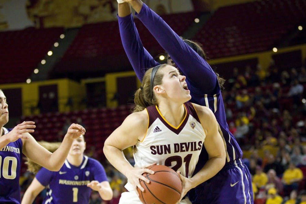 ASU senior forward Sophie Brunner (21) goes up for a tough basket during a women's basketball game versus no. 8 Washington in Wells Fargo Arena in Tempe, Arizona on Sunday, Jan. 15, 2017. ASU lost 65-54, putting them at 13-4 on the season.