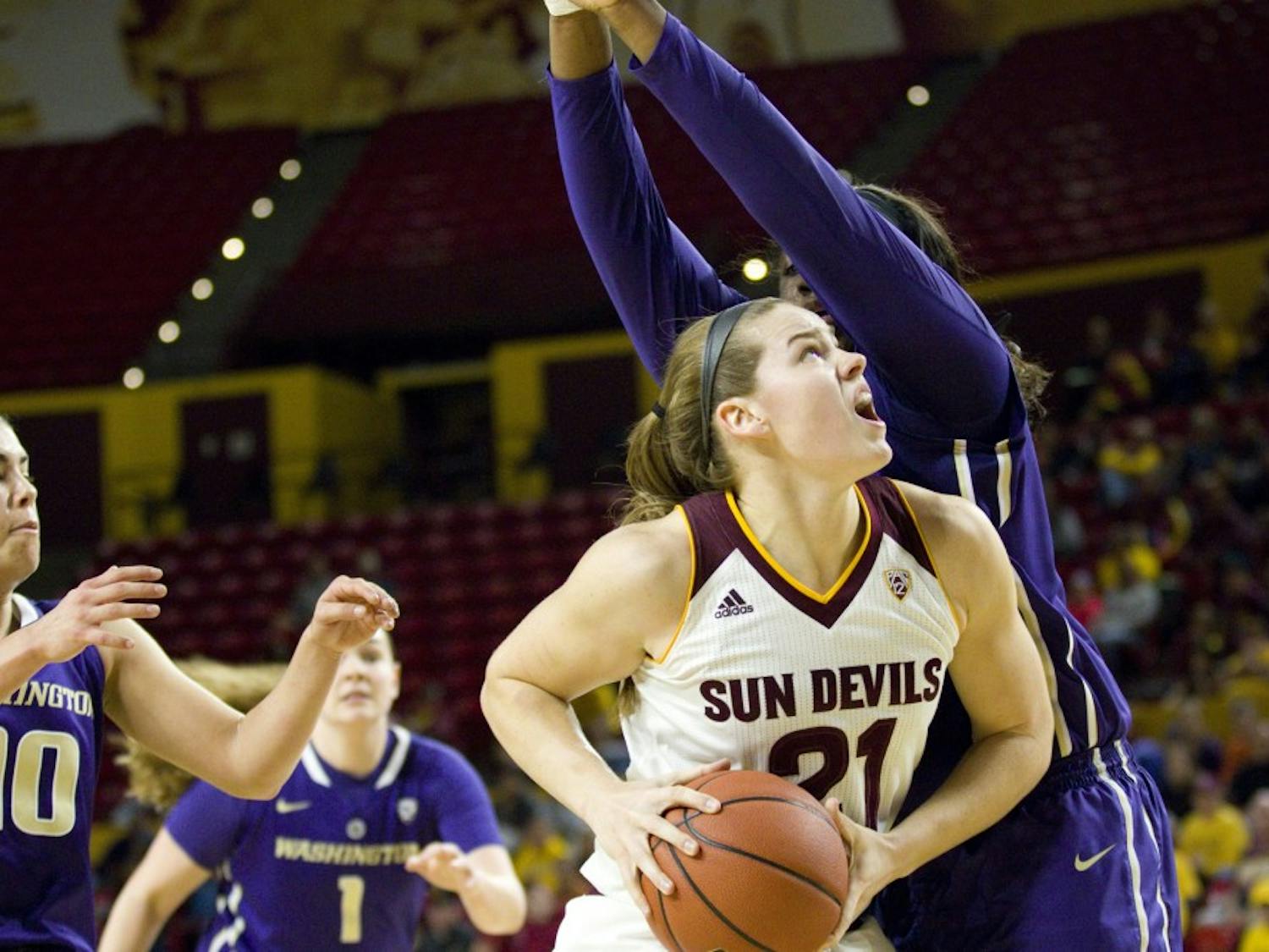 ASU senior forward Sophie Brunner (21) goes up for a tough basket during a women's basketball game versus no. 8 Washington in Wells Fargo Arena in Tempe, Arizona on Sunday, Jan. 15, 2017. ASU lost 65-54, putting them at 13-4 on the season.