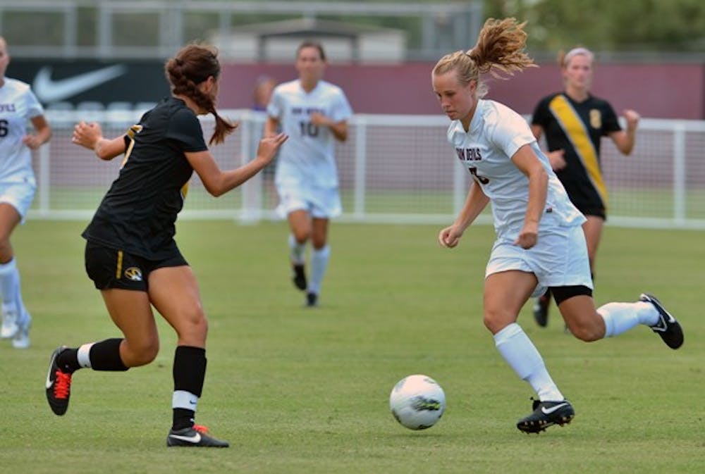 BIG STAGE: ASU redshirt junior Sierra Cook tries to beat a Mizzou defender during the Sun Devils’ 1-0 loss to Missouri in September. The Sun Devils face off against Stanford on Friday, a game that will be shown on Fox Soccer Channel. (Photo by Aaron Lavinsky)