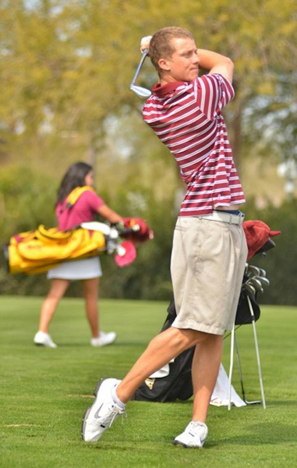 Last shot: ASU senior Scott Pinckney holds his finish on the driving range at ASU’s Karsten Golf Course. The ASU Thunderbird Invitational this weekend is the last chance for the seniors to get a win on home turf. (Photo by Aaron Lavinsky)
