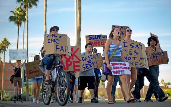 SHOWING SOME SKIN: On Saturday afternoon, several dozen ASU students joined together to protest society's frequency to blame sexual violence and rape on the victim, often questioning their clothing or attire. The so-called "Slut Walk" was inspired by a Toronto police officer's recommendation in January that rape would not occur if women did not dress like sluts. (Photo by Michael Arellano)