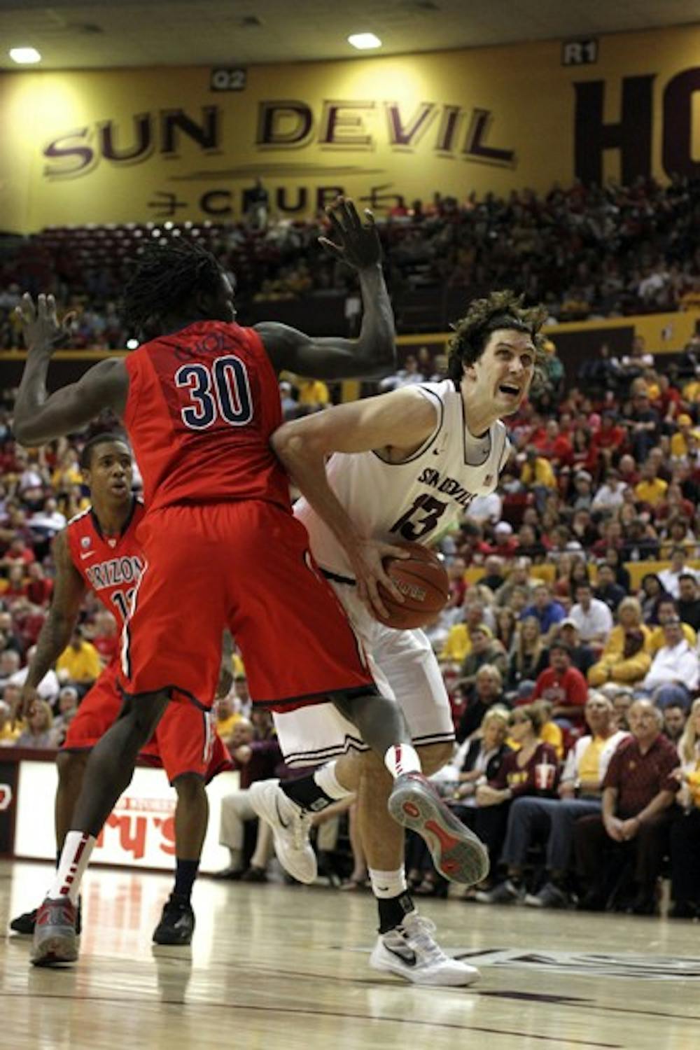 Jordan Bachynski drives around a defender in a game against UA on March 4. Bachynski and the Sun Devils believe they can win the Pac-12 tournament and get into the NCAA tournament. (Photo by Sam Rosenbaum)