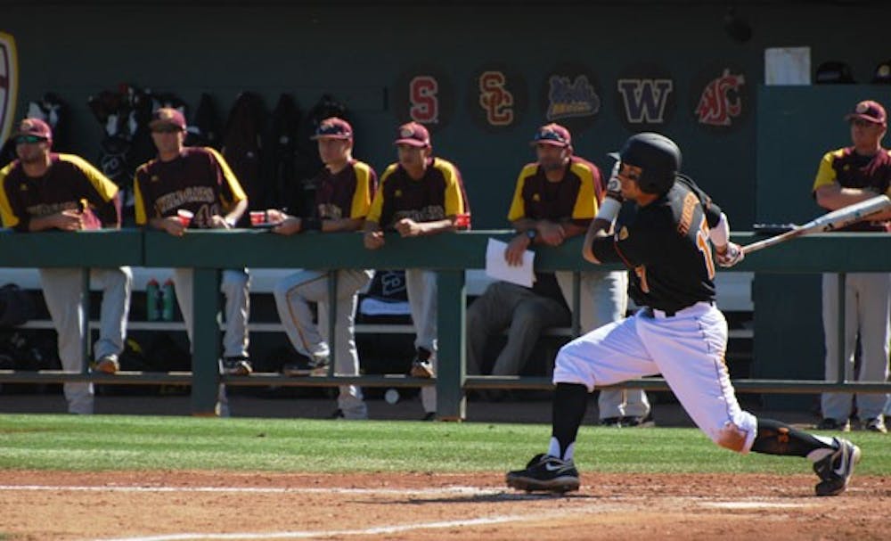 Freshman infielder Drew Stankiewicz heads toward first base after connecting on a pitch against Bethune-Cookman on Feb. 17. The ASU offense has lead the Sun Devils to a 4-2 start. (Photo by Murphy Bannerman)