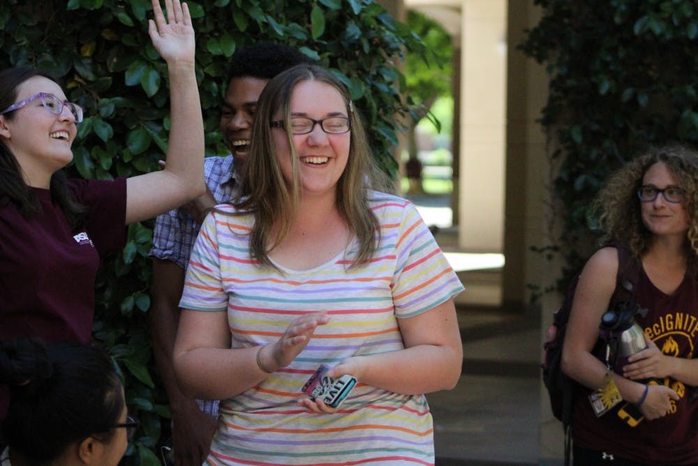 Natasha Snider celebrates after receiving confirmation that she will be Undergraduate Student Government West's next president, on Thursday, March 30, 2017.