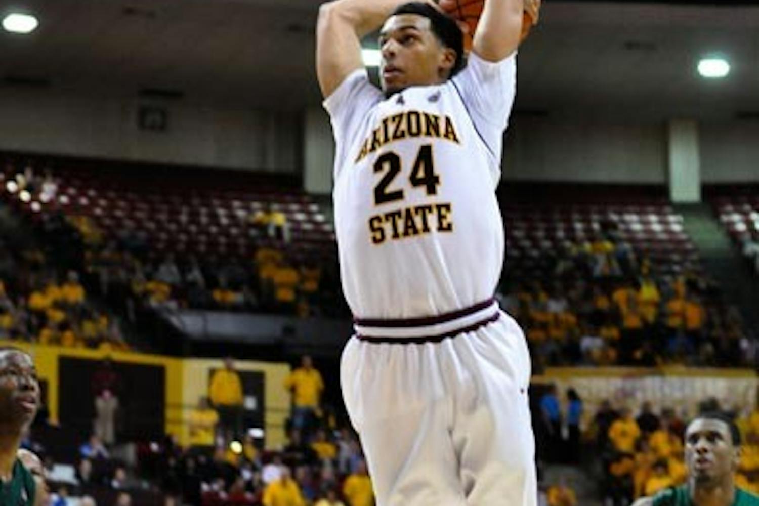 LEADING MAN: Sophomore guard Trent Lockett goes up for a dunk during last weekend's game against UAB. Lockett led ASU to two wins over the weekend in the Great Alaksa Shootout, scoring 24 points against Weber State and 18 against Houston Baptist. The Sun Devils fell Saturday to St. Johns in the tournament championship game with senior guard Ty Abbott leading the way with 22 points.
