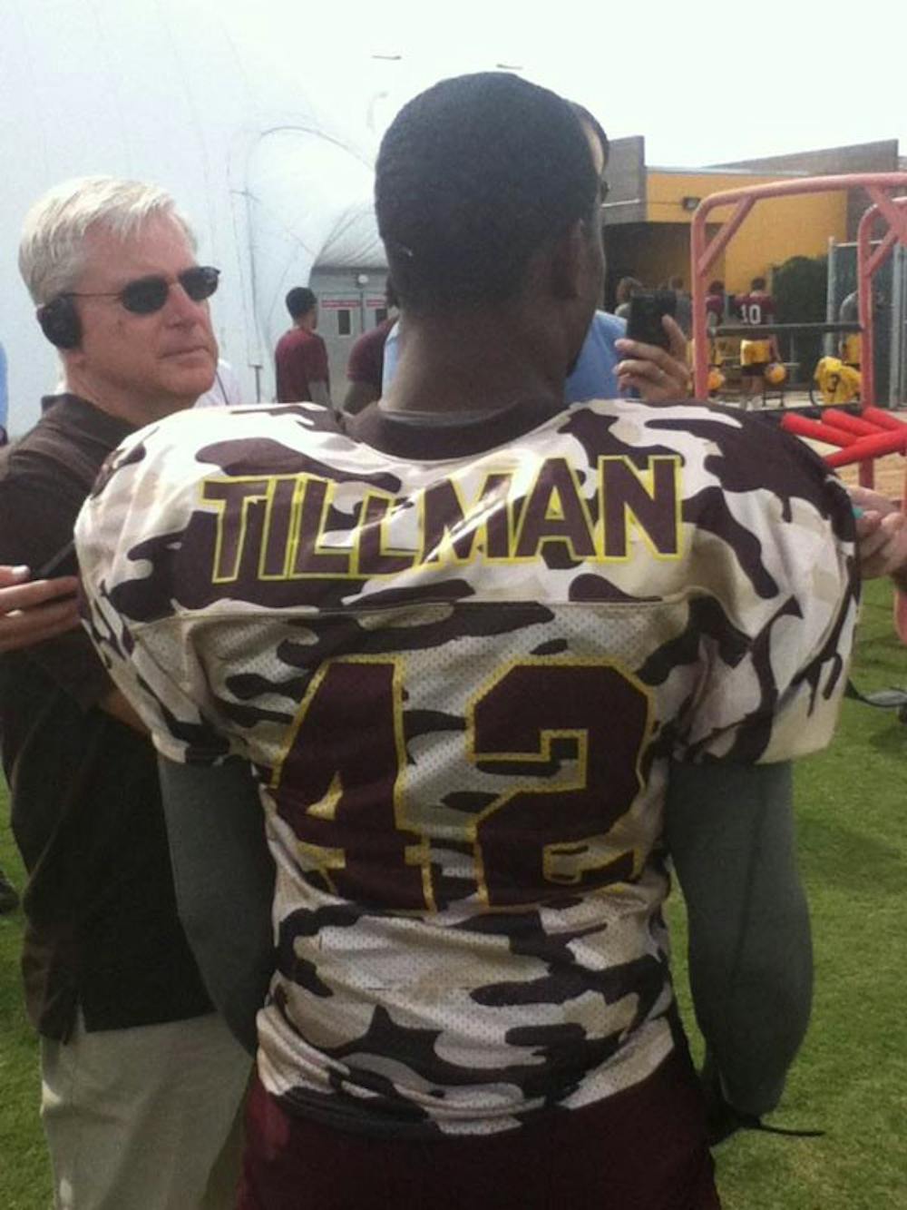Junior safety Alden Darby speaks to reporters on Tuesday in his Pat Tillman camouflage jersey, an honor awarded by football coach Todd Graham. (Photo by Master Tesfatsion)