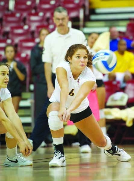 BUMP IT UP: Freshman setter Stephanie Preach moves to bump a ball during Saturday's ASU Sheraton Tournament. ASU went 1-2 in the tournament, the final non-conference event of the regular season. (Photo by Michael Arellano)