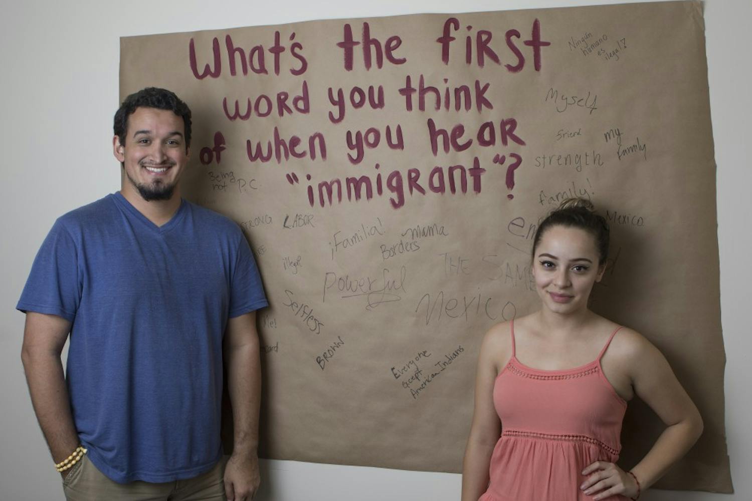 Senior Tansborder Chicana/o Latina/o Studies major Jesse Docherty (cq) and junior Political Science major Alexis Bustillos-Hernandez (cq) pose for a portrait in front of a poster created for the Tunnel of Awareness on Thursday Oct. 15, 2015, at the El Concilio office in the Memorial Union in Tempe. 