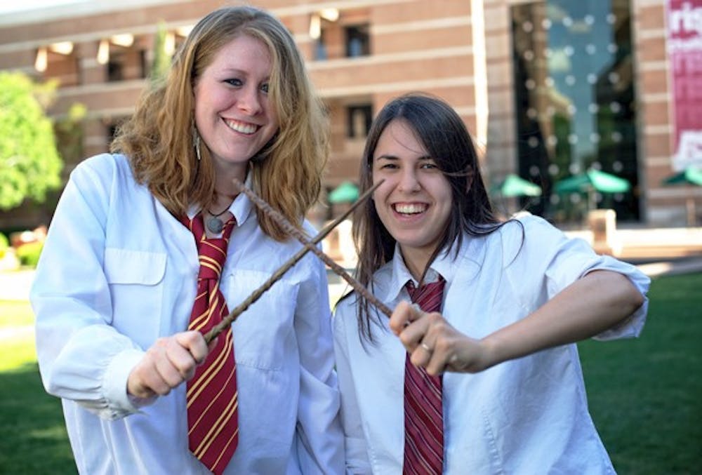 WEST HOGWARTS: Sophomores Jessie Korinek and Kassi Macias disguised themselves as witches  as part of an all day Harry Potter celebration on the West campus. The celebration, coordinated by students enrolled in the Harry Potter and American Culture course, involved quidditch matches, wand-making and other sorcerer activities. 