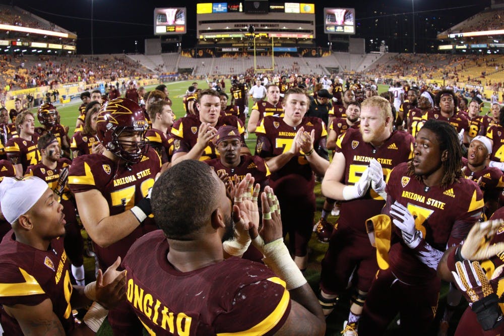 The Arizona State football team chants their alma mater after the game against University of Southern California Saturday, Sept. 26, 2015 at Sun Devil Stadium in Tempe. The Trojans defeated the Sun Devils 42-14. 