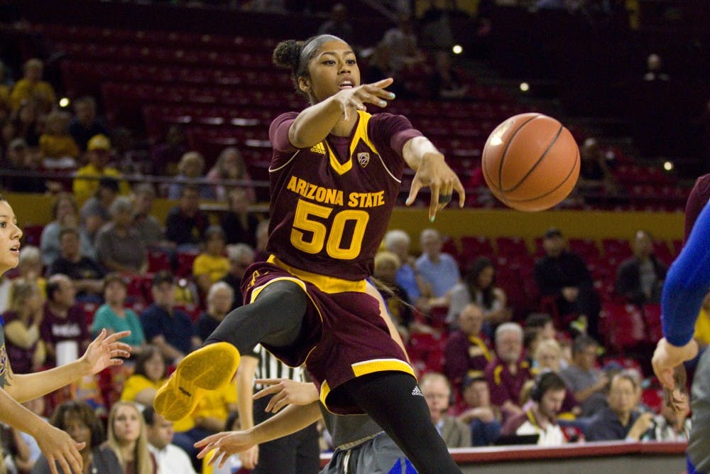ASU sophomore guard Armani Hawkins (50) gets hit as she passes the ball in a 82-37 victory over the San Jose State Spartans in Wells Fargo Arena in Tempe, Arizona, on Sunday, Nov. 13, 2016.