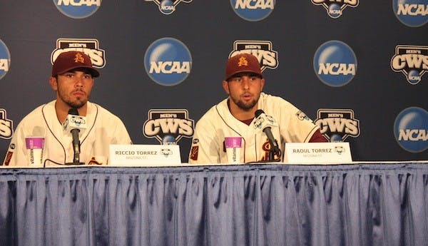 Brothers Riccio Torrez, left, and Raoul Torrez speak to the media following ASU's 6-3 loss to Clemson in the teams' College World Series opener in Omaha, Neb. (Photo by Nick Kosmider)