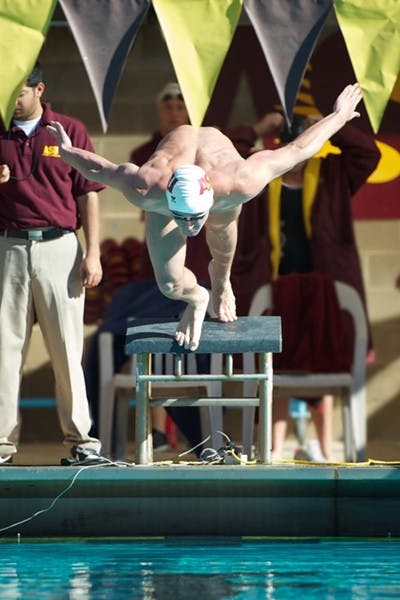 California-bound: ASU senior Nolan Ruane shoots off the blocks during the Sun Devils’ dual against Cal on Jan. 21. Ruane and the rest of the men’s swimming team head to Long Beach, Calif., on Wednesday for the Pac-10 Championships. (Photo by Michael Arellano)
