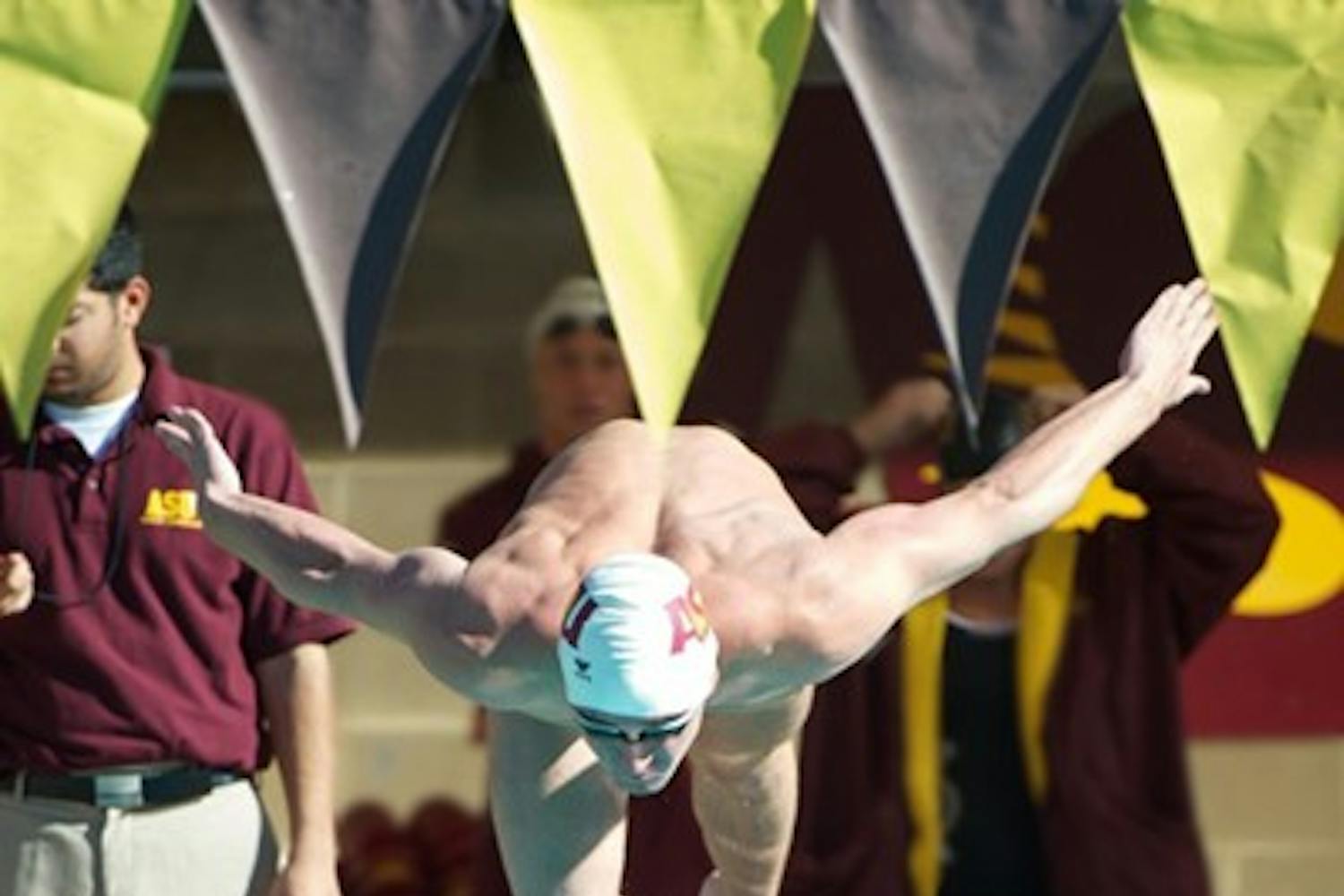 California-bound: ASU senior Nolan Ruane shoots off the blocks during the Sun Devils’ dual against Cal on Jan. 21. Ruane and the rest of the men’s swimming team head to Long Beach, Calif., on Wednesday for the Pac-10 Championships. (Photo by Michael Arellano)