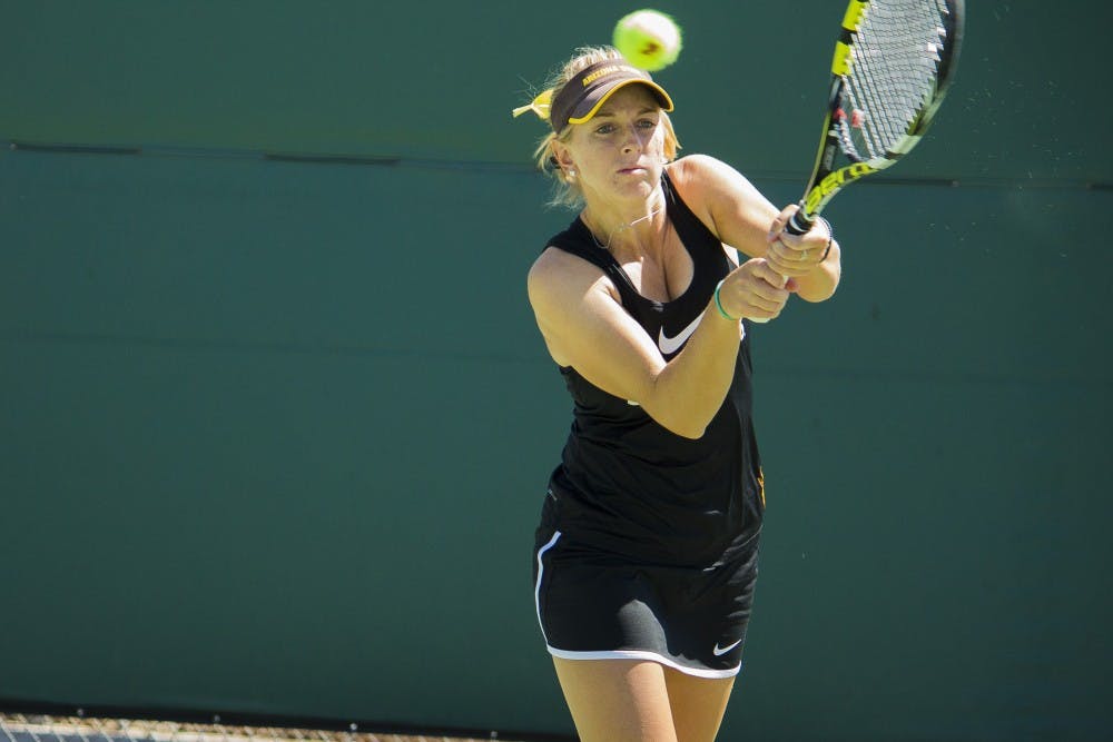 ASU Senior Joanna Smith returns with a backhand during her 4-6 6