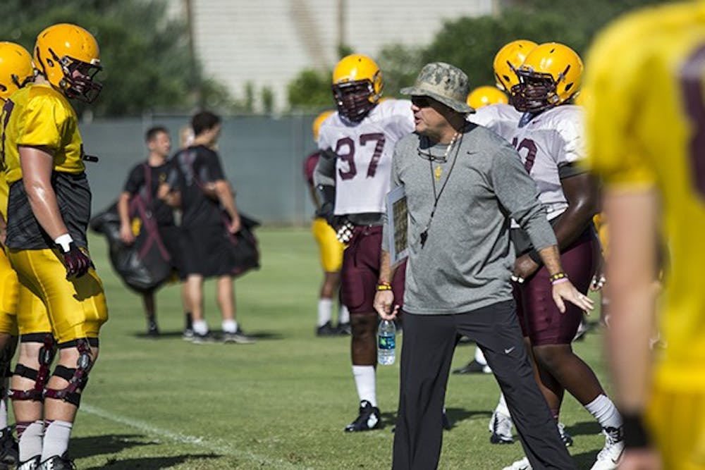 ASU head coach Todd Graham directs practice on Wednesday, Sept 10. Graham's team opens conference play on Saturday. (Photo by Alexis Macklin)