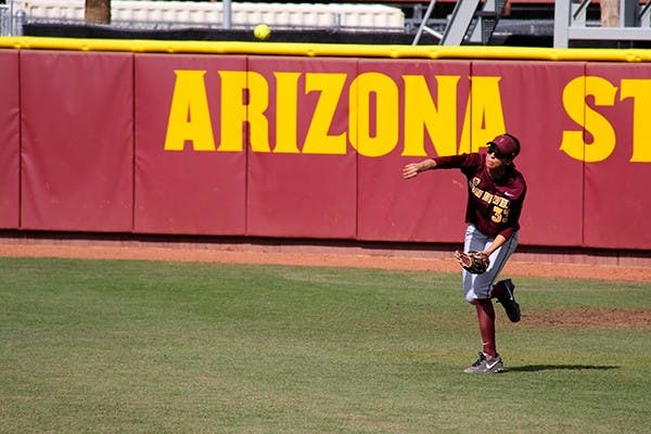 Senior outfielder Alix Johnson throws a fly ball back to her teammates during the Louisville Slugger Invitational against the Minnesota Golden Gophers at Farrington Stadium on Sunday, March 2. ASU lost 2-3. (Photo by Becca Smouse)