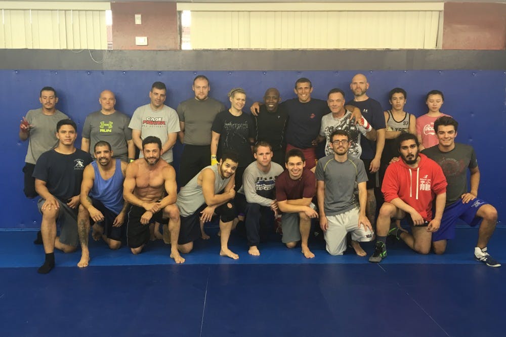 ASU's American Pankration club&nbsp;poses for a group photo with&nbsp;featured special guest coach, John Matthews, on&nbsp;Monday, Sept. 12, 2016.