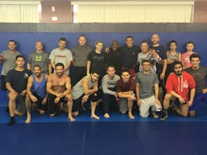 ASU's American Pankration club&nbsp;poses for a group photo with&nbsp;featured special guest coach, John Matthews, on&nbsp;Monday, Sept. 12, 2016.