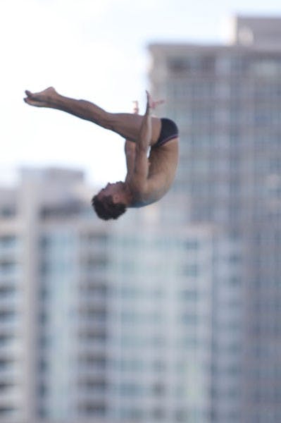 FLIP FLOP: ASU junior Chris Pasanella attempts a dive during practice earlier this season. Six divers will compete for ASU this weekend at the NCAA Zone E Diving Championships. (Photo by Scott Stuk)