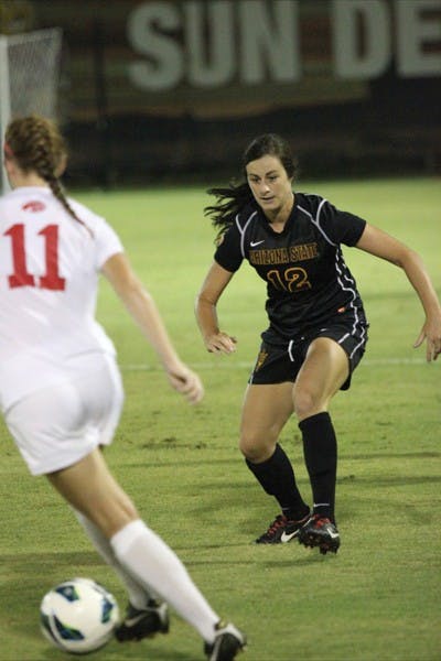 Redshirt forward and midfielder Courtney Tinnin winds up for a kick during the Sun Devils’ 5-4 double overtime win over USC on Friday. (Photo by Kyle Newman)
