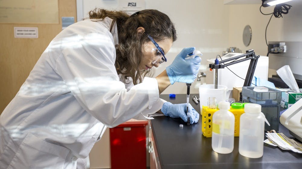 Nutrition and Dietetics major Almarie Riveria measures the PH balance of a DevilWASTE sample at the Phoenix Biomedical Campus on Thursday, Oct. 8, 2015. ASU researchers started the DevilWASTE program to analyze the nutritional habits of students over the course of their freshman year.