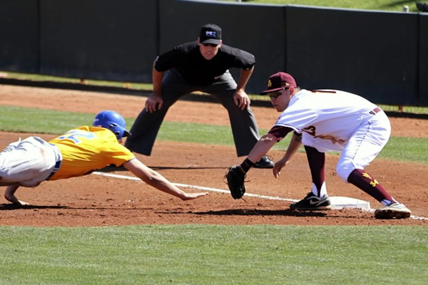Abe Ruiz tags out a runner in a game against UC Riverside on Saturday. Ruiz continued his season-long hot streak at the plate, hitting his third home run of the season in Friday night’s game against the Highlanders. (Photo by Sam Rosenbaum)