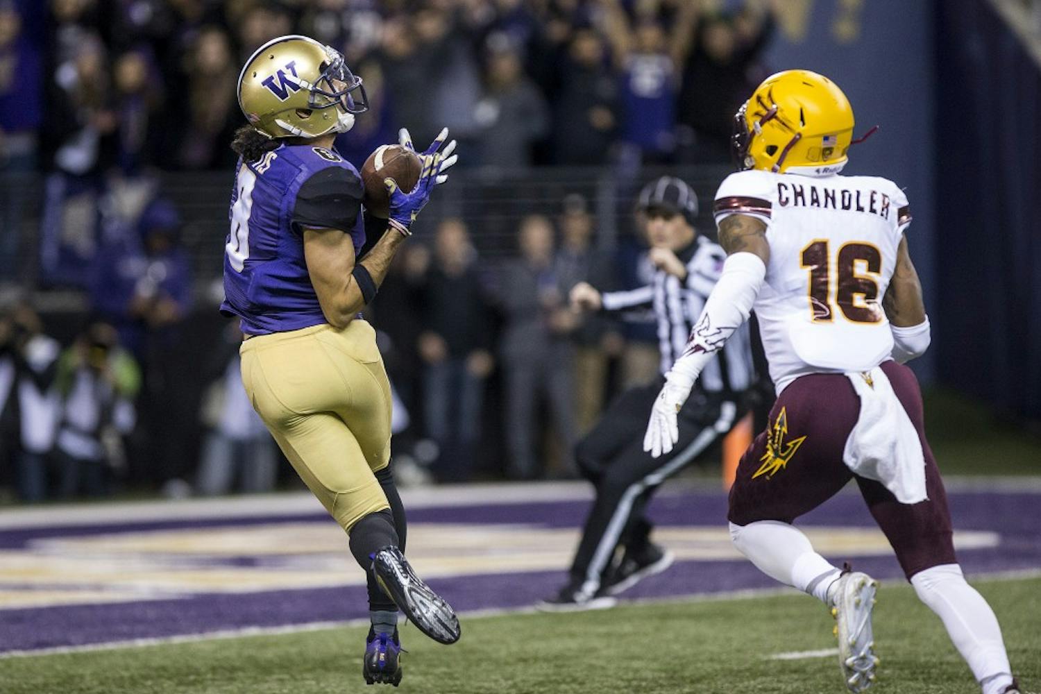 UW wide receiver Dante Pettis pulls in a touchdown pass during a football game against the UW Huskies on Saturday, Nov. 19, 2016, in Husky Stadium in Seattle, Washington. 