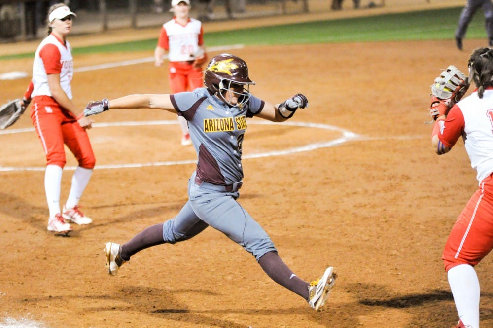 &nbsp;Senior outfielder Allie Butterfield stretches to beat the throw to first base during a game against Houston on Friday, February 26, 2016 at Farrington Stadium in Tempe, AZ.