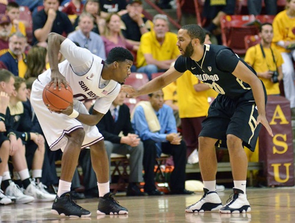 Carrick Felix sizes up a defender in a game against Colorado on Feb. 11 . Felix missed the past several games because of an illness, but is expected to return against UA on Sunday. (Photo by Aaron Lavinsky)