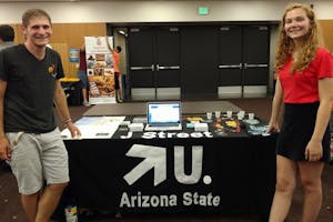 Members, Jonathan Wasserman and Ellie Carstens, at a tabling event in the Memorial Union.