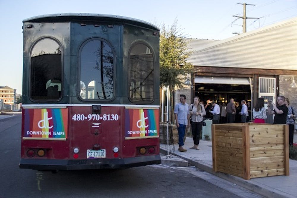Downtown Tempe (formerly Mill Aveune District) unveils the new Downtown Tempe logo with a new street car on Wednesday, Nov. 12, 2014 at Culinary Dropout in Tempe. (Photo by Alexis Macklin)