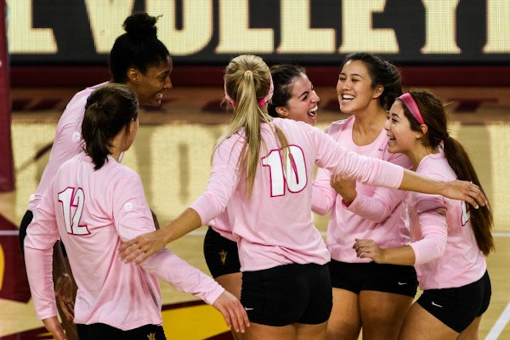 Junior setter Bianca Arellano celebrates after the Devils force a game point in the fifth set during the match vs Washington State on Sunday, Oct. 19th, 2014, at Wells Fargo Arena in Tempe. The Sun Devils would rally from two sets down to beat the Cougars 3-2. (Photo by Daniel Kwon)