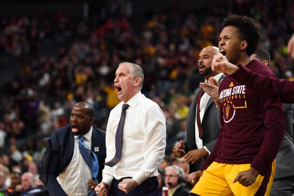 Bobby Hurley celebrates