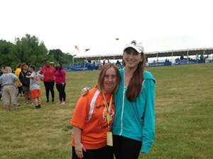 ASU student Kelly McCormack and her sister Meghan McCormack pose for a picture during the Special Olympics in Shelton, Connecticut on June 7, 2014.&nbsp;
