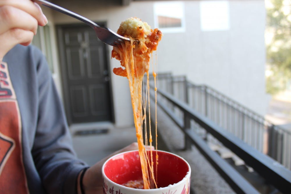ASU sophomore Victoria Hill holds up her finished product in Tempe, Arizona, on Sunday, Feb. 24, 2019.&nbsp;