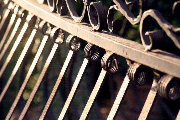 SERWAA ADU-TUTU | THE STATE PRESSSUNSET: The gleem of the setting sun relects off a rail at the Hacienda Del Sol Hotel in Tuscon Tuesday evening.