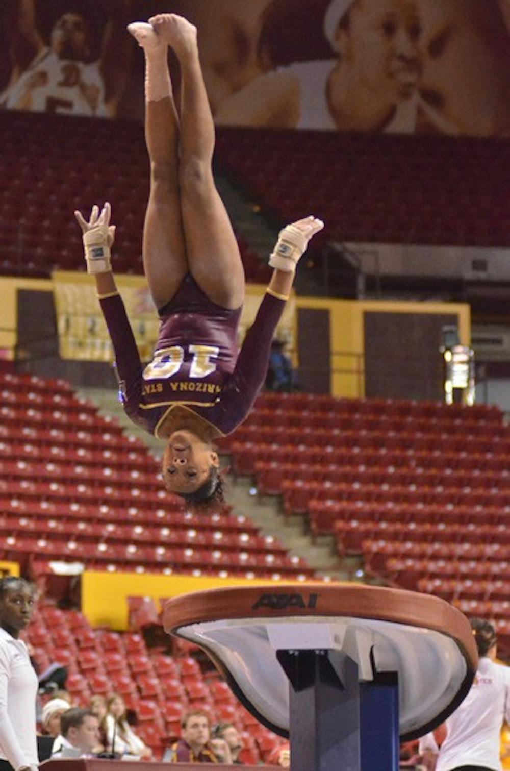NCAA bound?: ASU senior Beaté Jones flies through the air mid-vault during the Sun Devils’ loss to Oregon State on Feb. 6. Jones and junior Madison Snowden will find out Monday afternoon whether they qualified for the NCAA Championships. (Photo by Aaron Lavinsky)