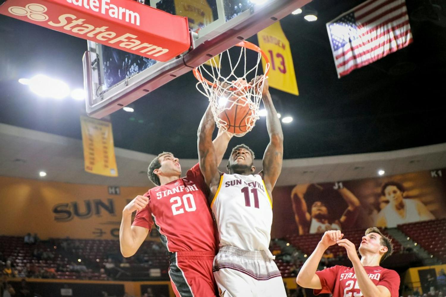 Junior Forward Savon Goodman makes the  shot amidst heavy Cardinal defense during the game against Stanford on  Thursday, March 3, 2016 at the Wells Fargo Arena in Tempe, AZ. (J.  Bauer-Leffler/The State Press)
