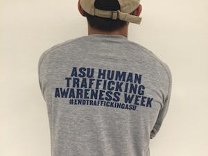 Junior journalism major, Angel Mendoza poses for a picture in an All Walks Project shirt about ASU&nbsp;Human Trafficking Awareness Week on 27th September 2016.